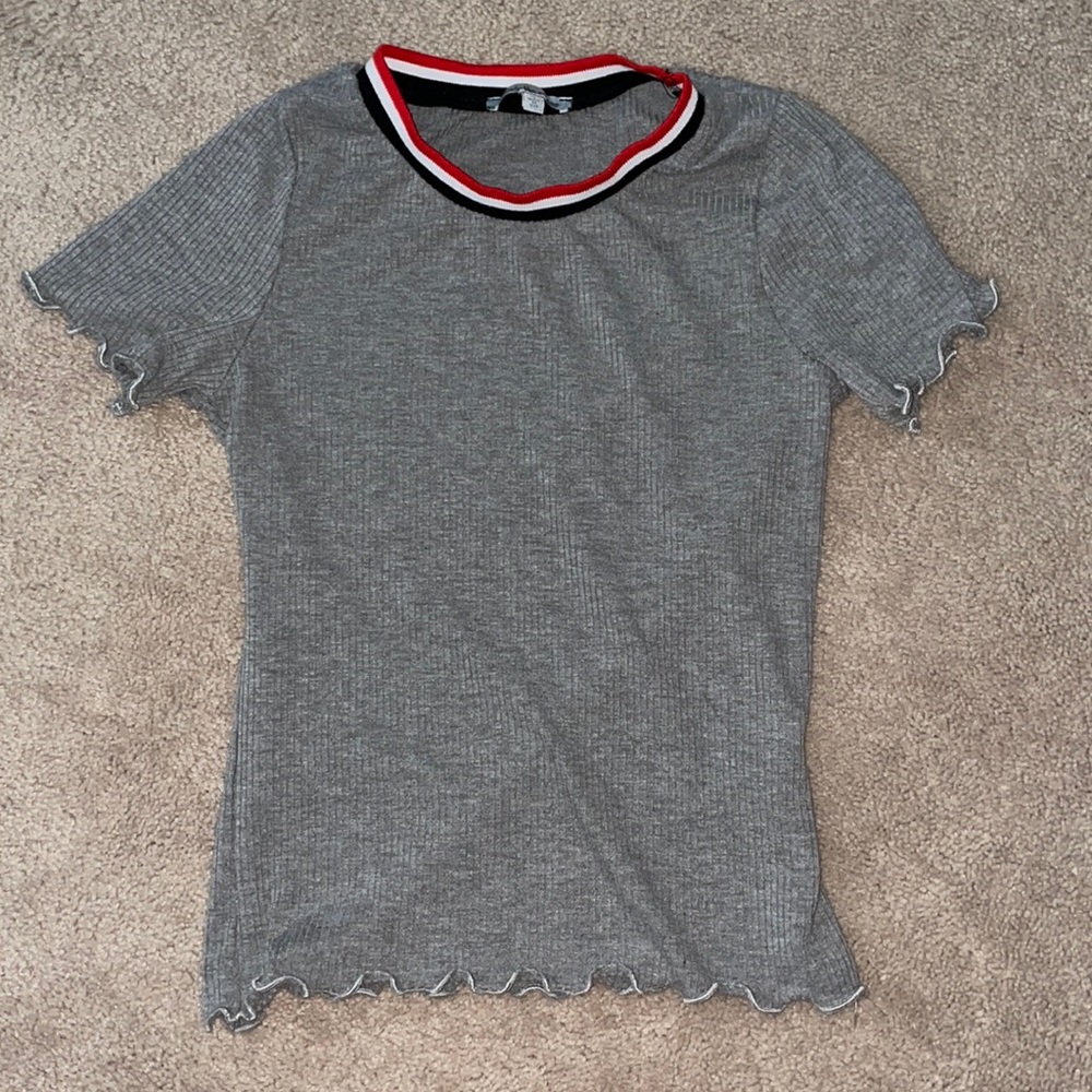 grey tight fitting shirt